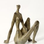 Figura asseguda
